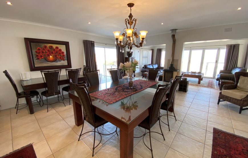 01 Dining Room Table With Malawian Hut Door Inset Below Glass 870x555